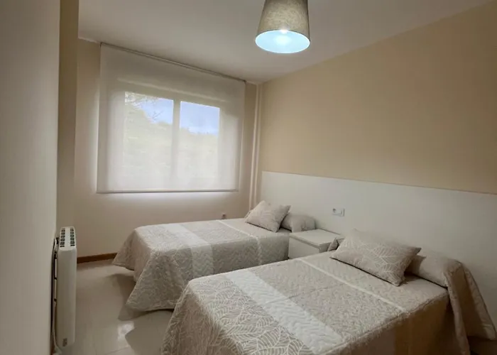 Env Langosteira Апартаменты